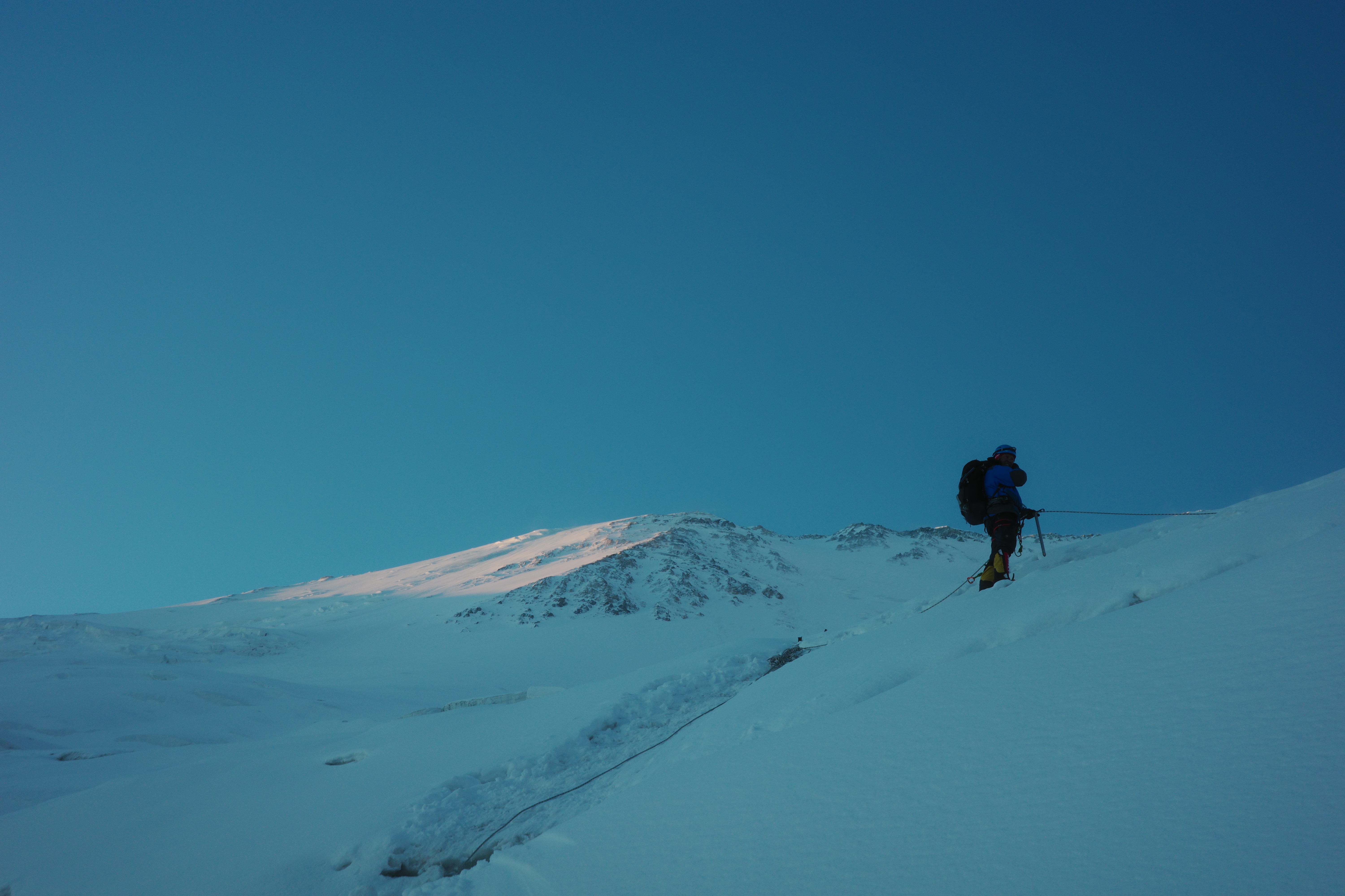 a climber ascending by a fixed rope